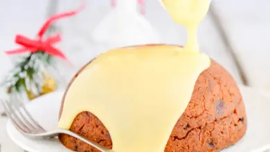 1-Cup Christmas Puddings with Syrup on a Plate