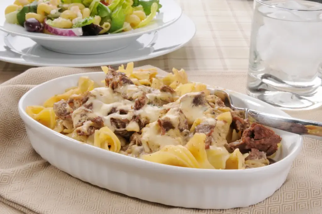 A Bowl of Beef Stroganoff with a Pasta Salad 