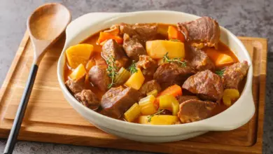 Beef and Guinness Stew on a Wooden Table