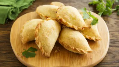 Chicken & Chorizo Empanadas On A Wooden Table