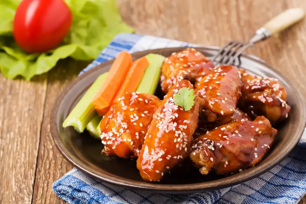 Chicken Wings in Honey Sauce Sprinkled with Sesame Seeds