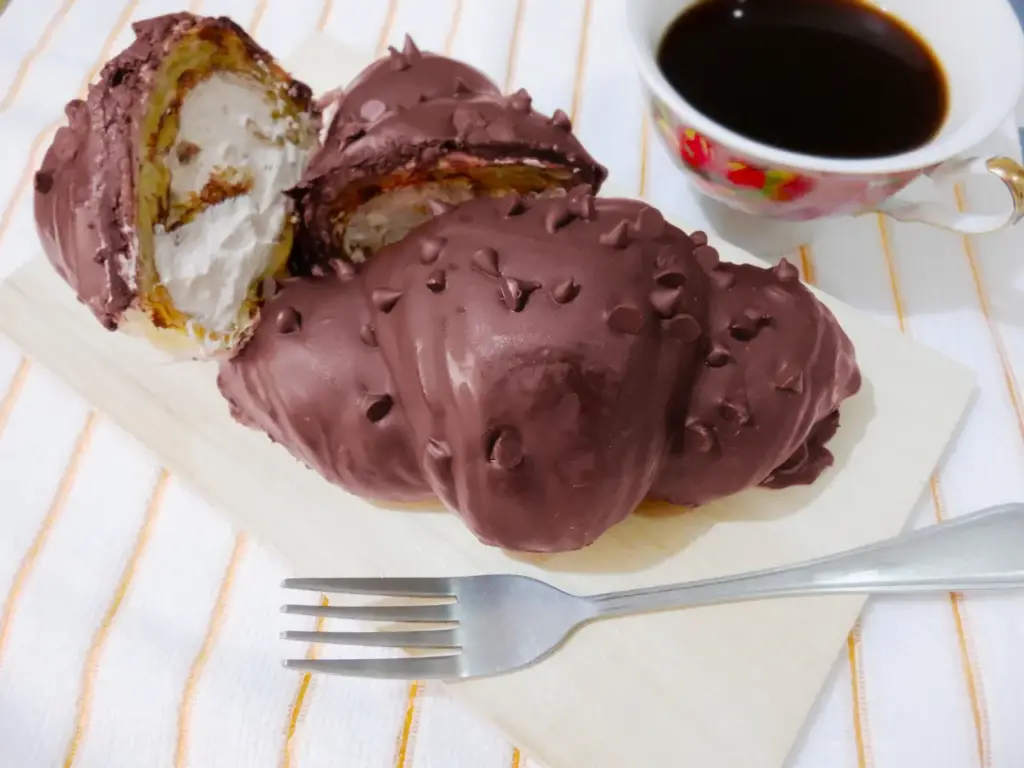 Chocolate Croissant on a White Plate 