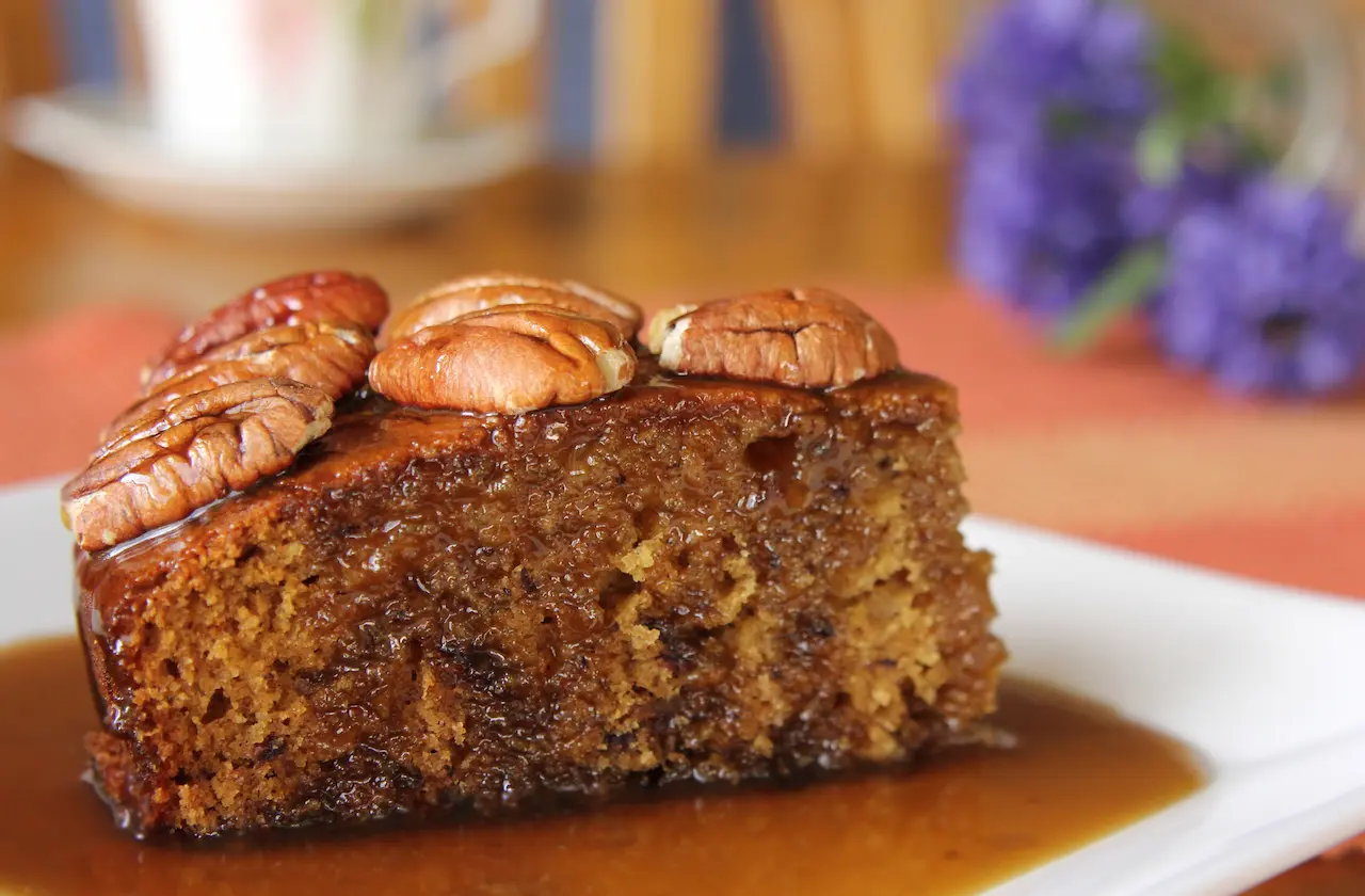 White Plate Filled Christmas Pudding w Butterscotch Sauce