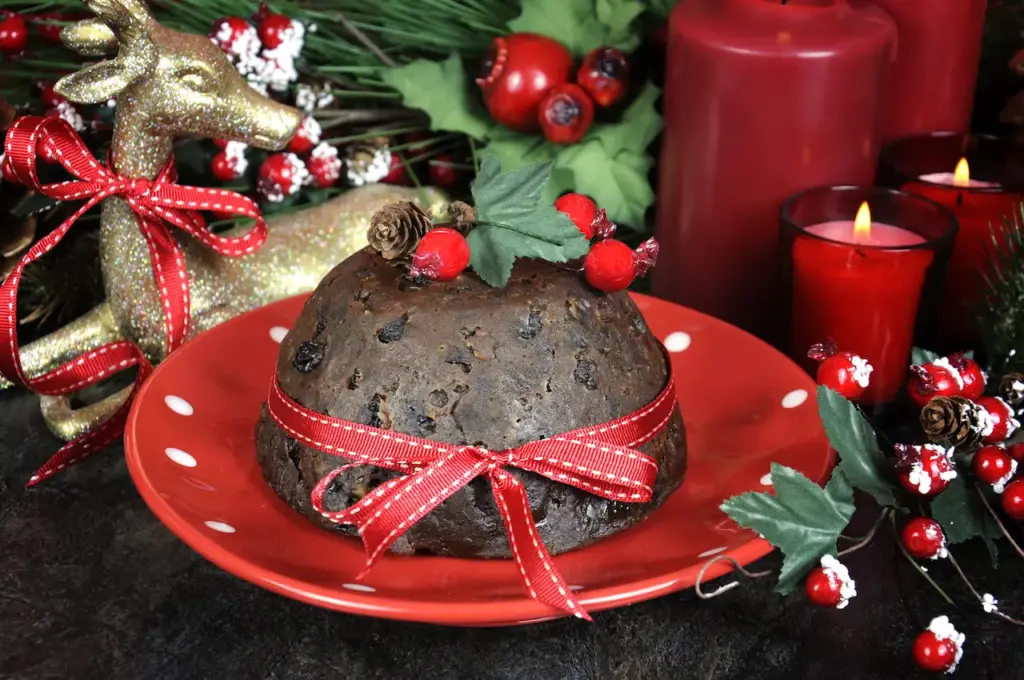 Christmas Pudding with Butterscotch Sauce with Ribbon