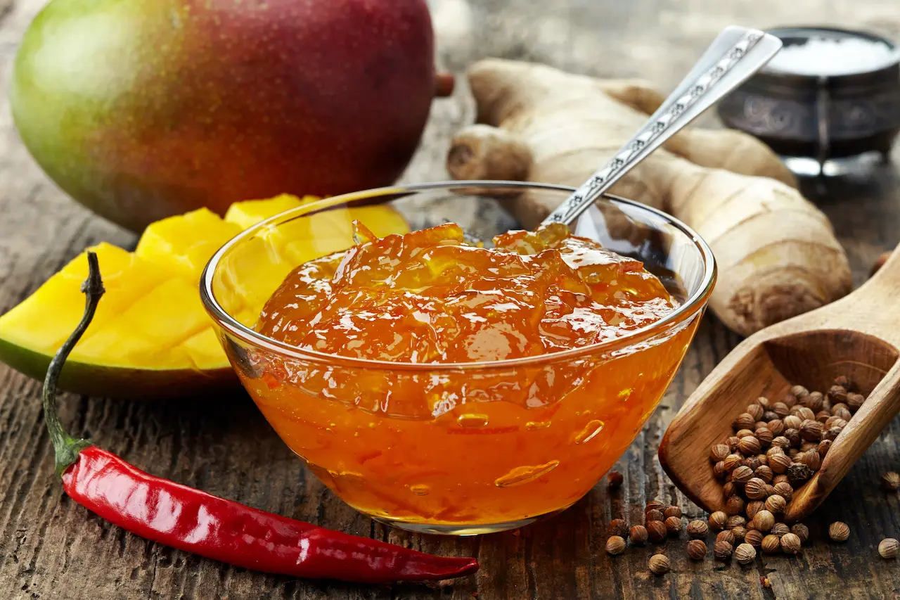 Clear Glass of Bowl Filled with Mango Chutney