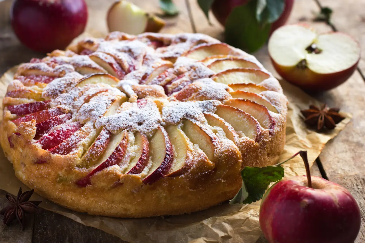 Mix and Bake Moist Apple Cake On Table Wood