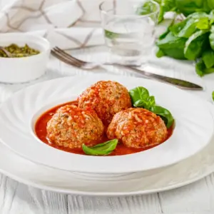 White Plate Filled With Porcupine Meatballs
