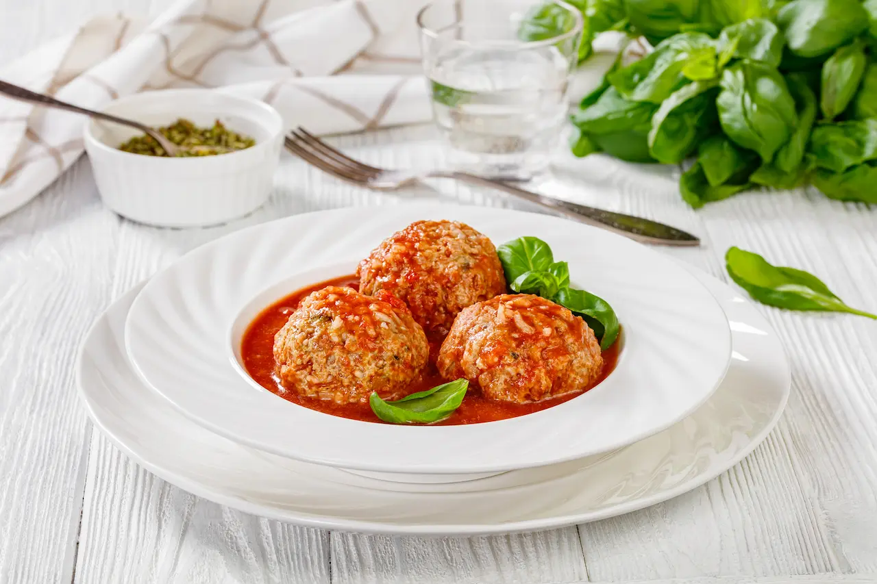 White Plate Filled With Porcupine Meatballs