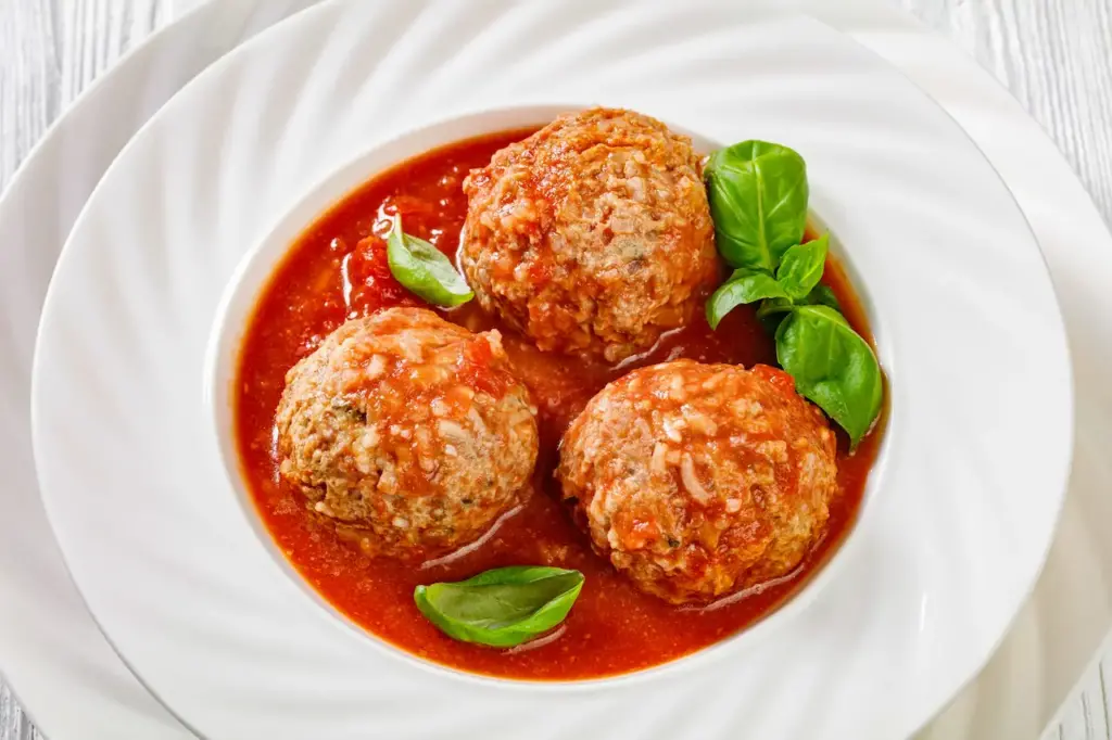 Porcupine Meatballs on a White Plate 