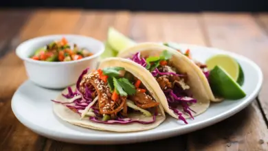 Pulled Pork Tacos on Top of Wooden Table