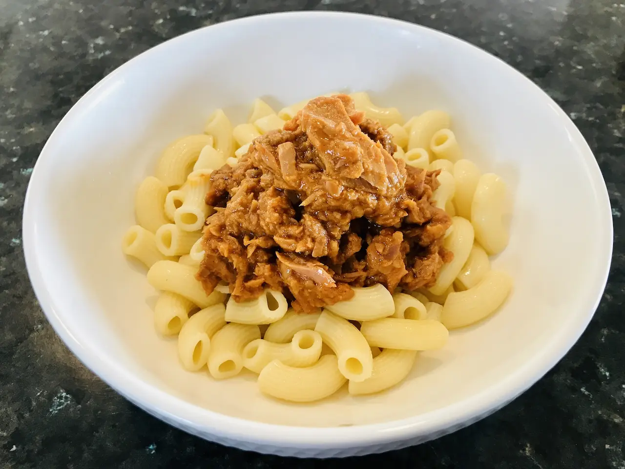 White Plate Filled with Quick Tuna & Pea Pasta