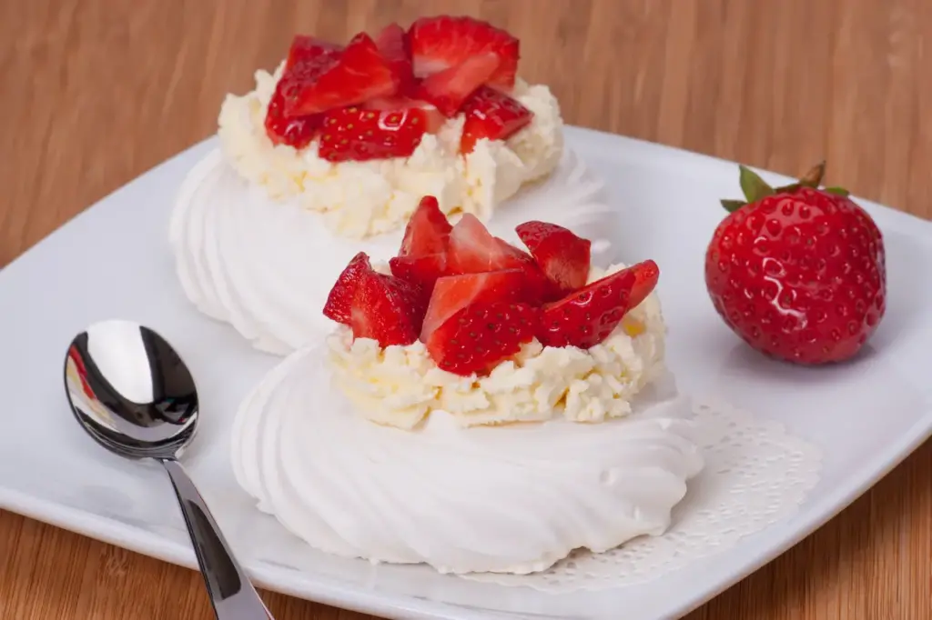 A Stovetop Pavlova With Strawberries on Top