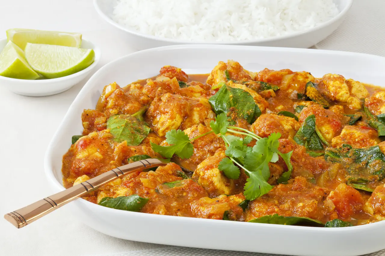 Chicken Saag on a White Plate