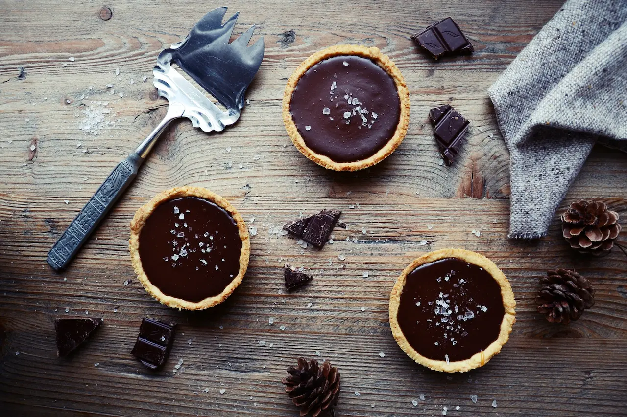 Choc Caramel Tarts on a Table Woods