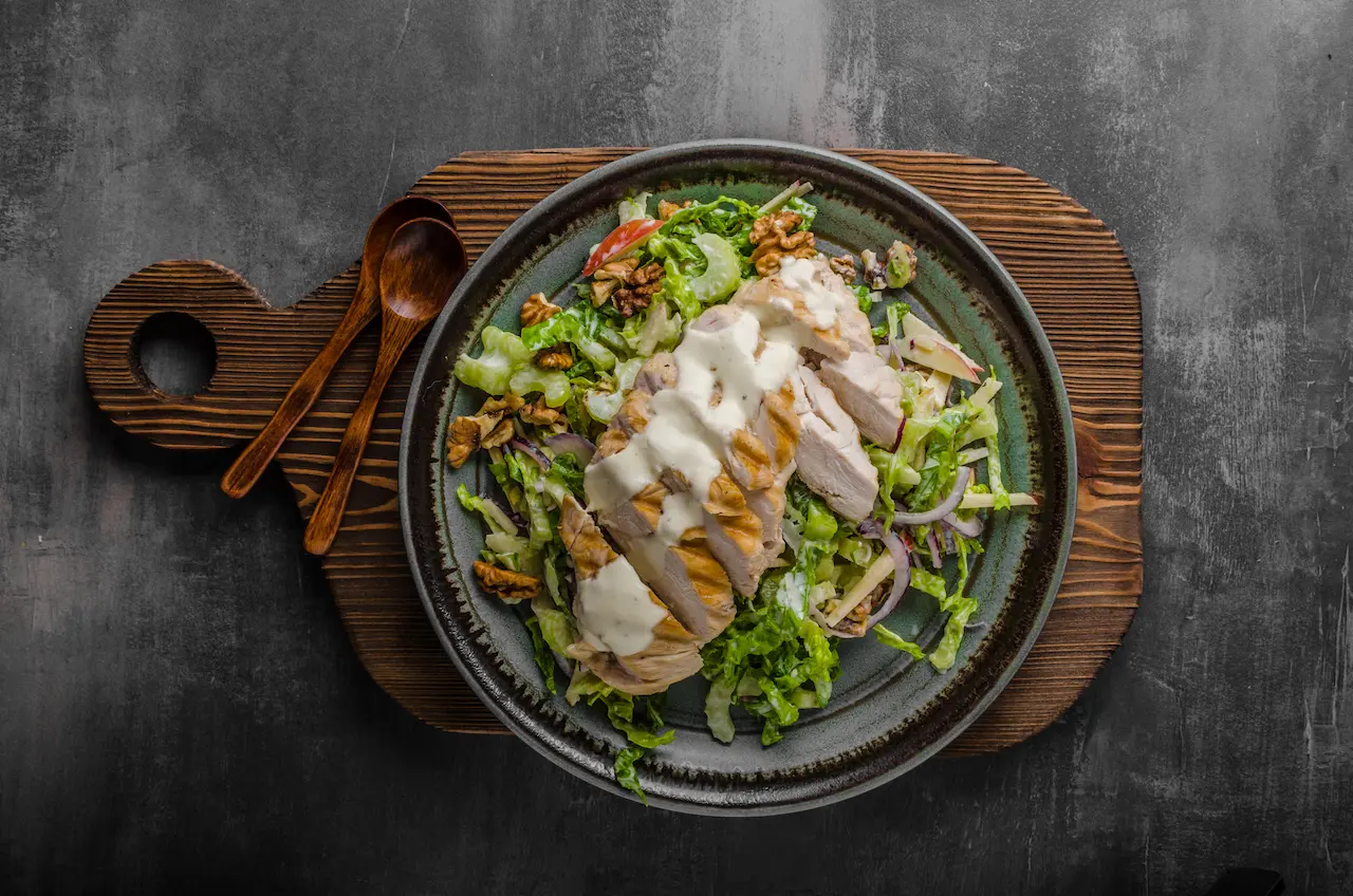Classic Chicken Waldorf Salad on a Wooden Chop