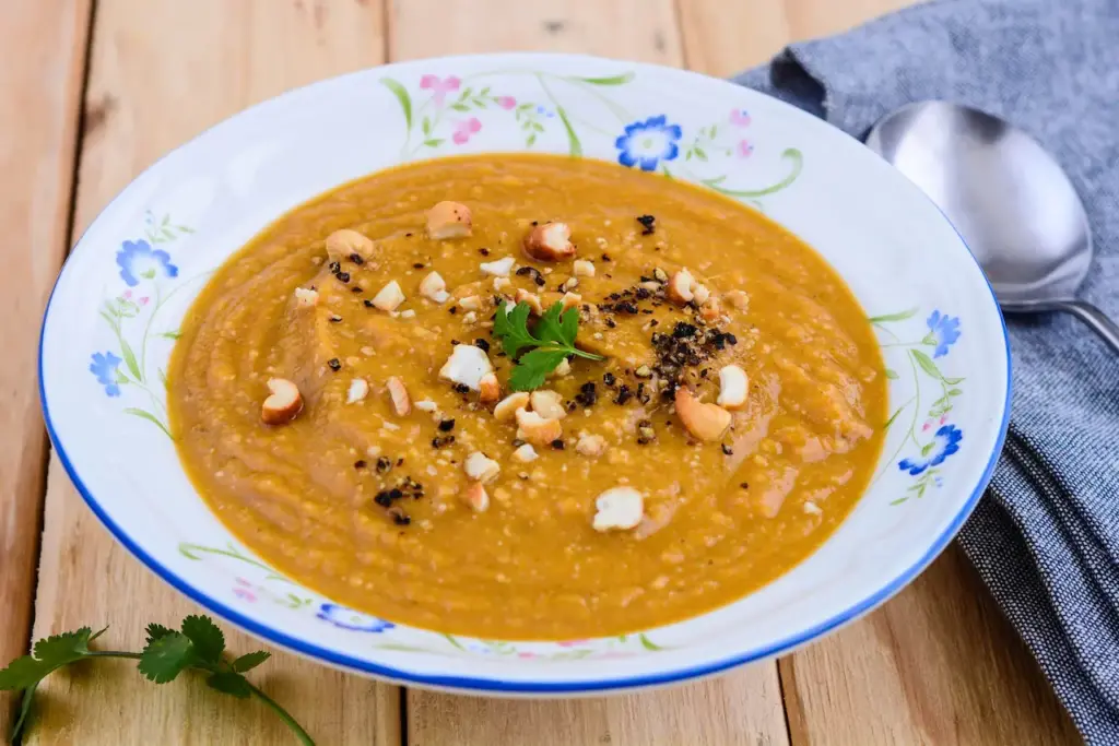 Moroccan Pear and Sweet Potato Soup on a White Plate