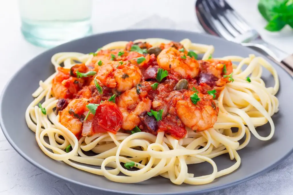 Prawn and Basil Linguine on a White Plate