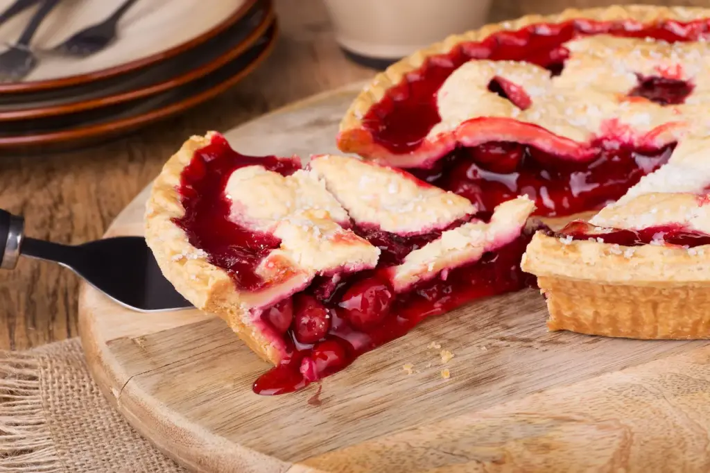 Cherry Pie on a Wooden Plate