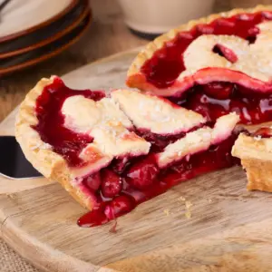 Cherry Pie on a Wooden Plate