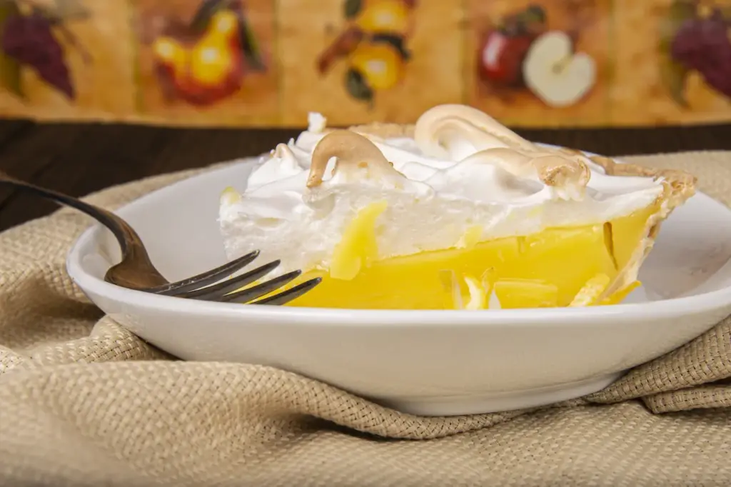 Pineapple Meringue Pie on a White Plate 