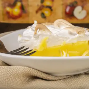 Pineapple Meringue Pie on a White Plate